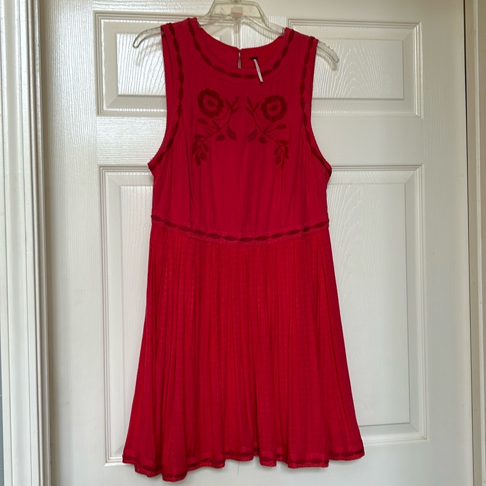 Free People coral red “birds of a feather” dress.
